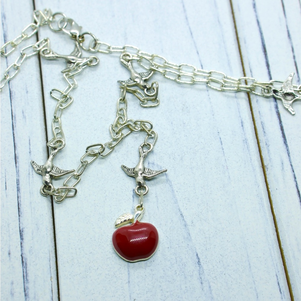 Handmade silvertone necklace with Bird pendants and an apple pendants.